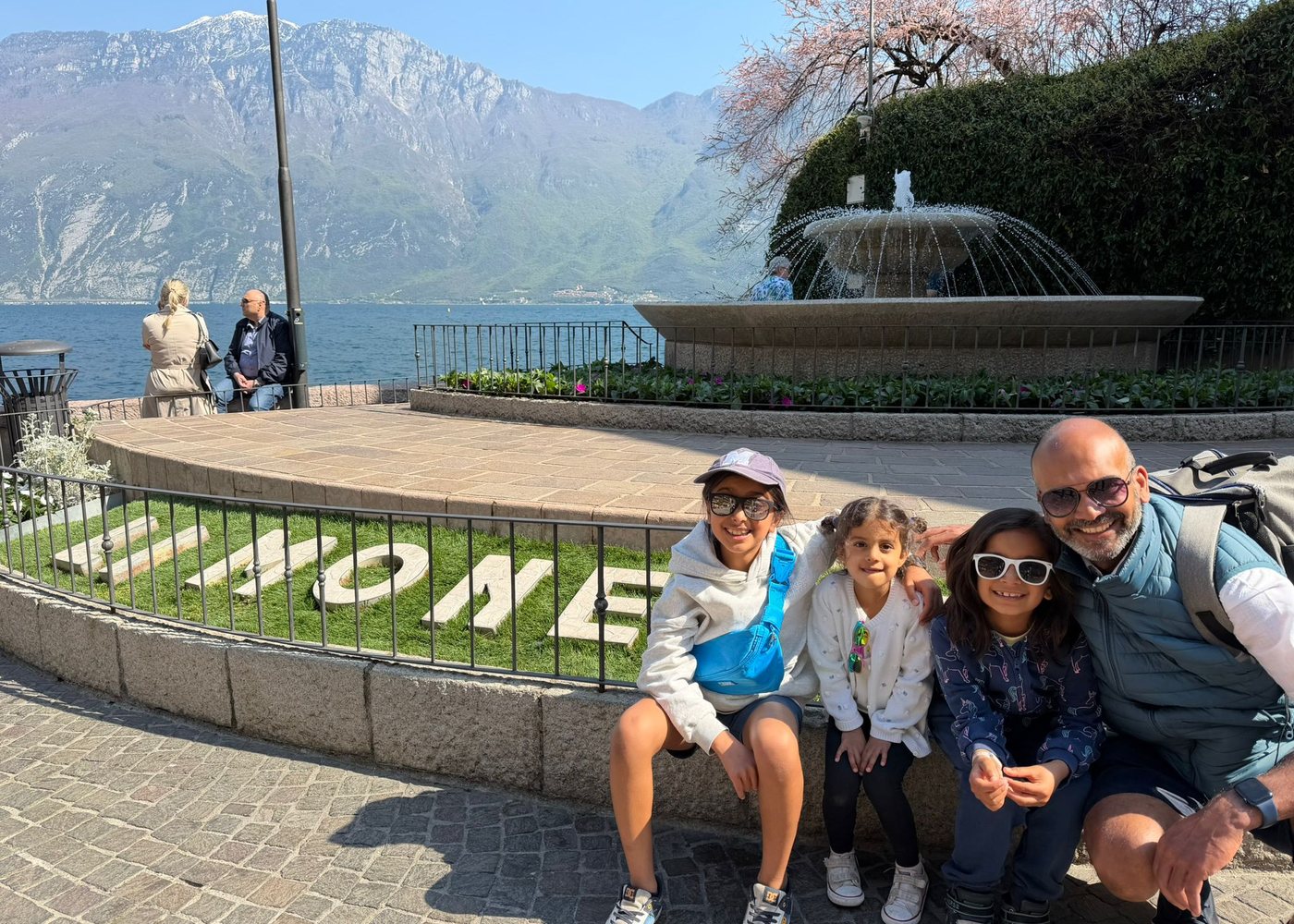 Rav and his three children by Lake Garda