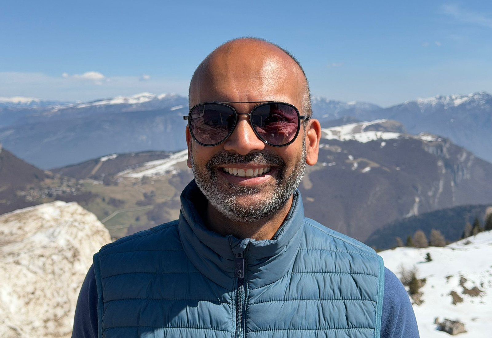 Rav travelling by a turquoise lake